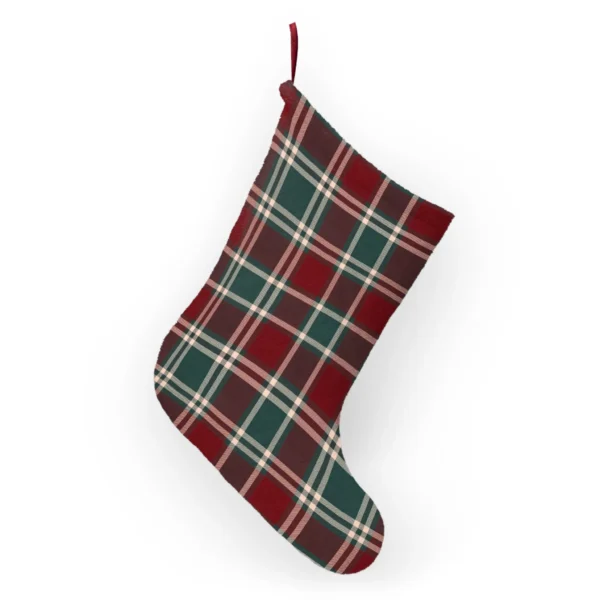 Back of the burgundy tartan stocking hanging from its ribbon loop, plaid printed on both sides