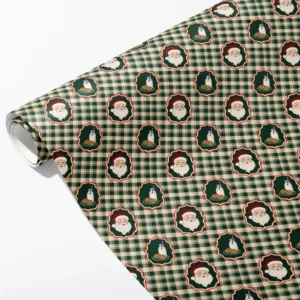 Roll of green gingham wrapping paper with Santa faces, milk and cookies, partly unrolled on a white background