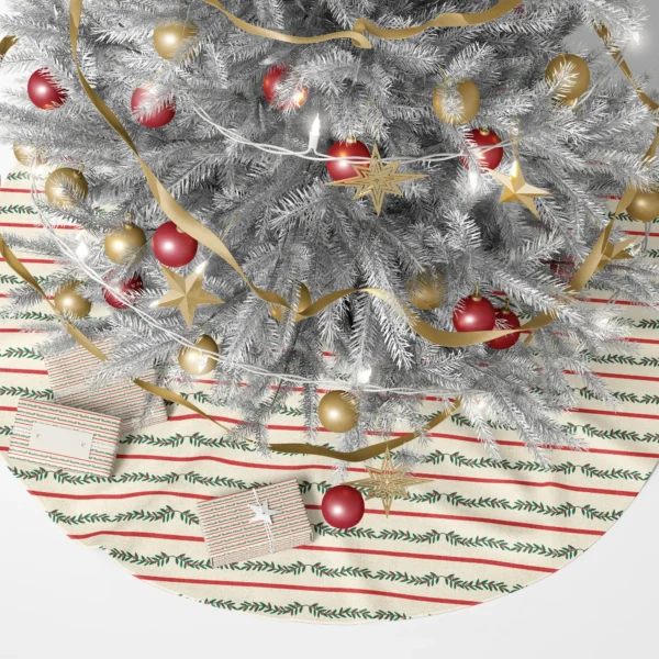 Cream striped tree skirt with berry garlands beneath a lit tree with wrapped presents