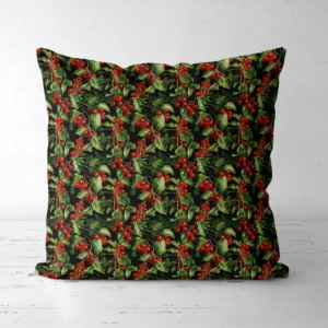 Black holly berry Christmas pillow standing on a white floor, front view