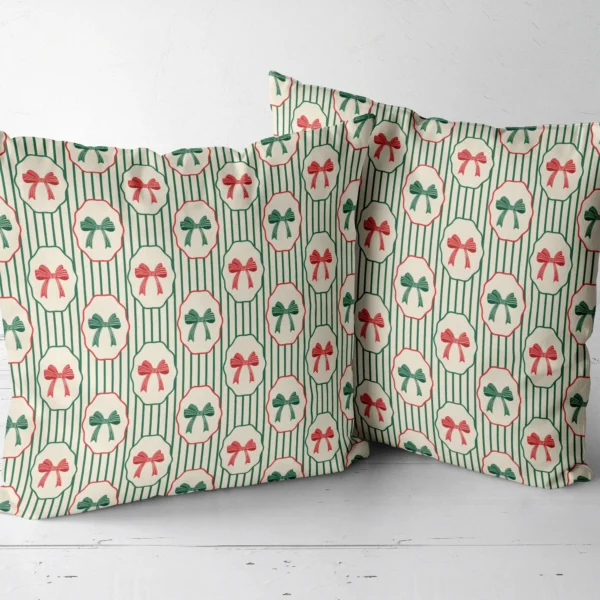 Pair of bow medallion cushions side by side