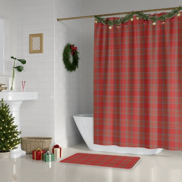 Bright red tartan Christmas shower curtain beside a white tub, with a wreath and a small lit tree