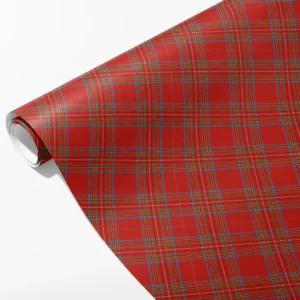 Roll of bright red tartan wrapping paper with fine blue, green, gold and white lines, partly unrolled on white
