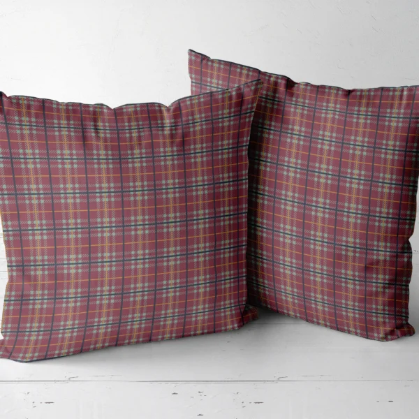 Two burgundy and sage plaid throw pillows side by side
