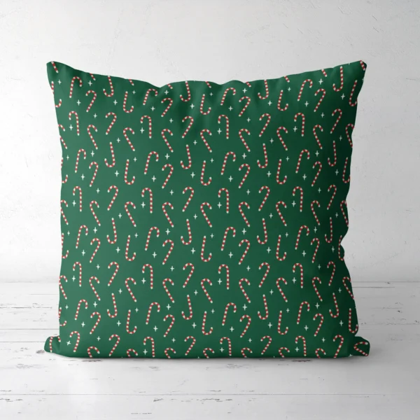 Candy cane Christmas pillow, front view, peppermint canes on deep green
