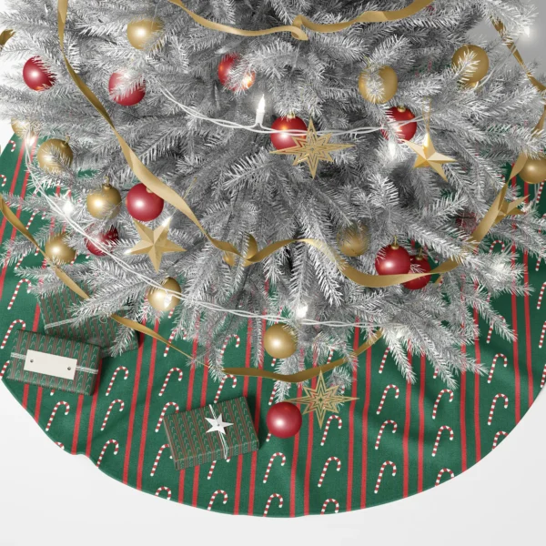 Green pinstripe tree skirt beneath a lit Christmas tree with gifts