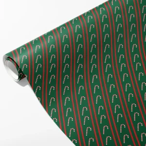 Roll of green wrapping paper with thin red pinstripes and columns of small upright candy canes, partly unrolled on white