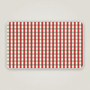 Candy stripe plaid Christmas bath mat with a white bound edge, seen from above