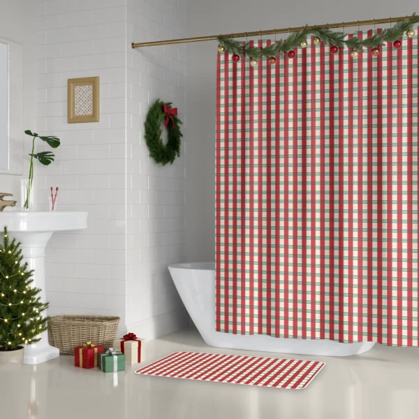Candy stripe plaid Christmas shower curtain beside a white tub, with a wreath and a small lit tree