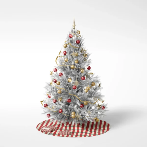 Decorated tree on a white backdrop resting on the red and green stripe plaid skirt