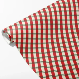 Roll of cream wrapping paper with red vertical bands crossed by fine green pinstripes, partly unrolled on white
