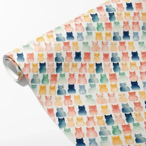 Roll of cream wrapping paper with blush, navy, mustard and sage watercolor-style cats, partly unrolled on white