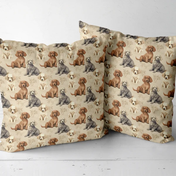 Two throw pillows with a brown, gray and cream puppies on beige print side by side