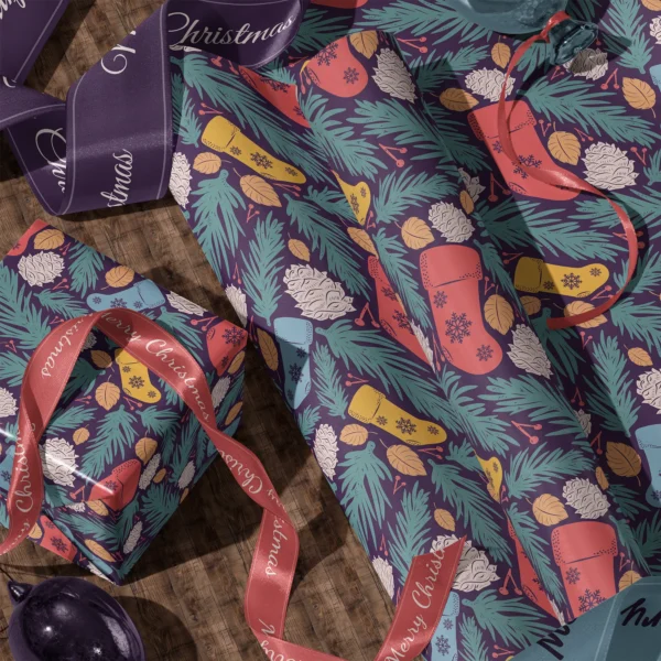 A sheet of plum stocking gift wrap and a wrapped box with satin ribbons on a wooden floor
