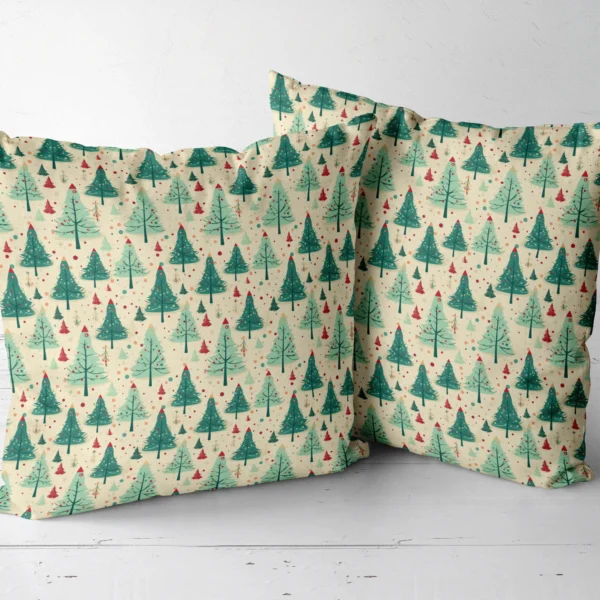 Pair of cream bauble tree Christmas pillows next to one another