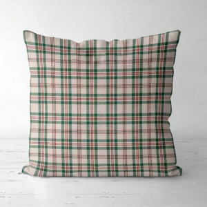 Cream plaid Christmas pillow, front view, standing on a white floor