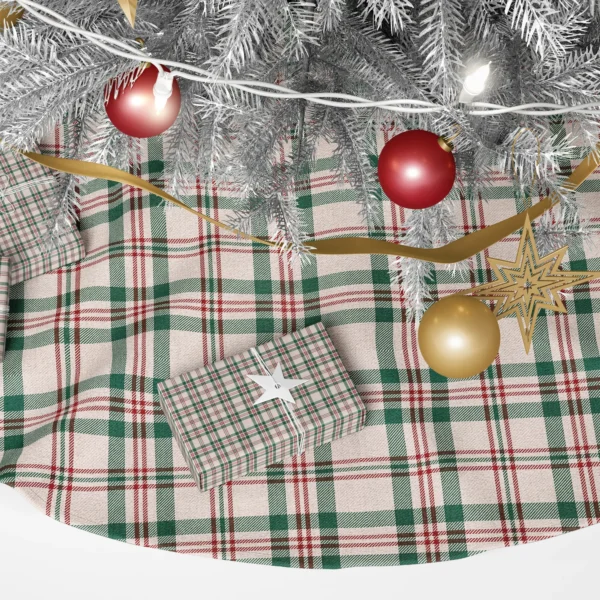 Close-up of the ivory check with forest green stripes and thin red and brown lines