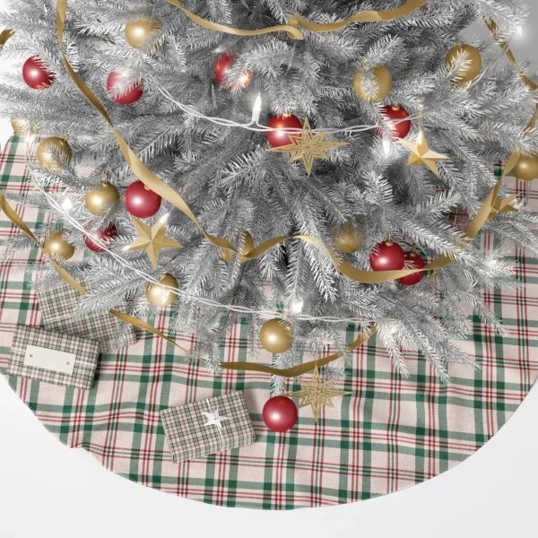 Cream plaid tree skirt under a lit Christmas tree with wrapped gifts