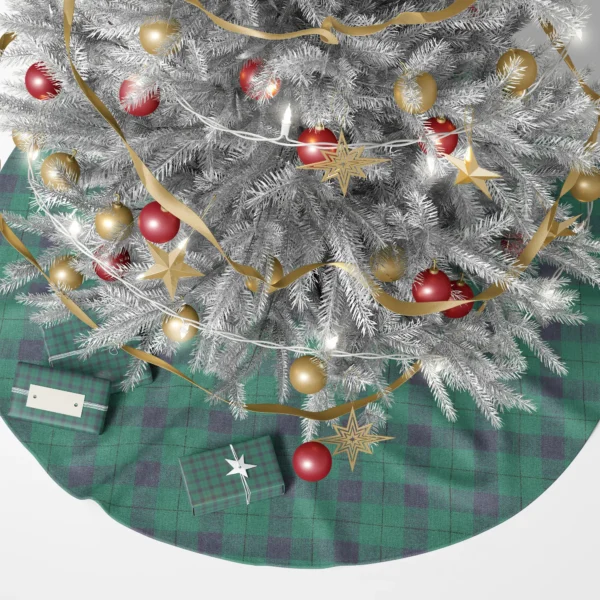 Green and navy check tree skirt under a lit Christmas tree with gifts