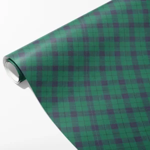Roll of emerald green and navy check wrapping paper with fine black pinlines, partly unrolled on white