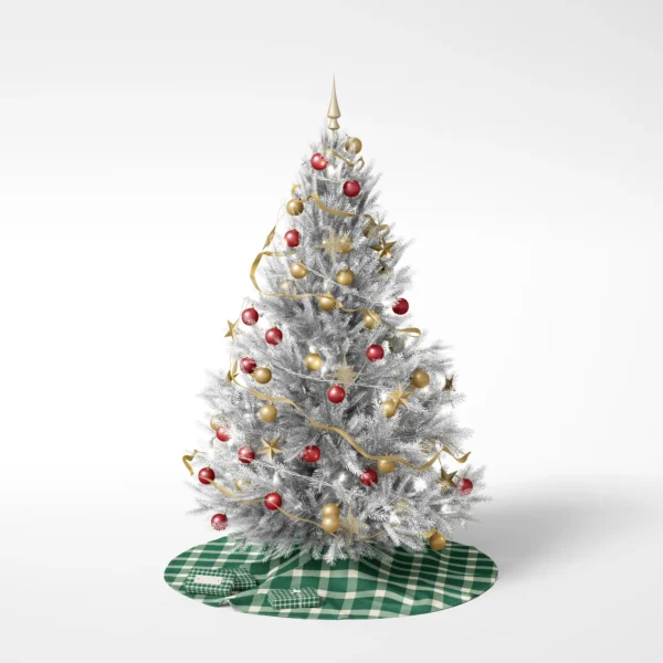 Decorated tree on white resting on the all-green gingham skirt