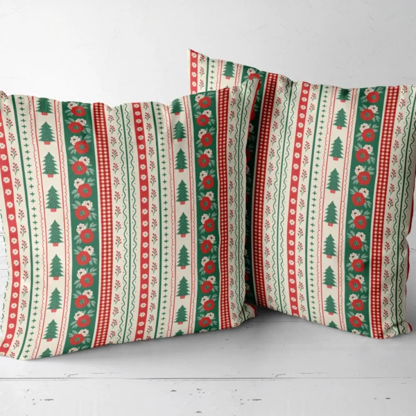 Two folk border throw pillows standing side by side
