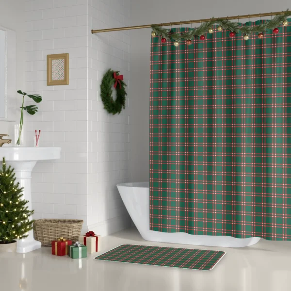 Forest green windowpane Christmas shower curtain beside a white tub, with a wreath and a small lit tree