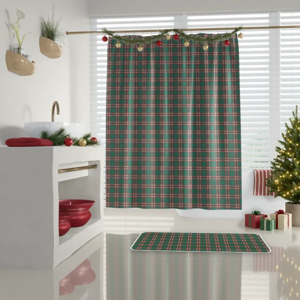 Forest green windowpane shower curtain in a white bathroom with red towels on a shelf and a decorated tree