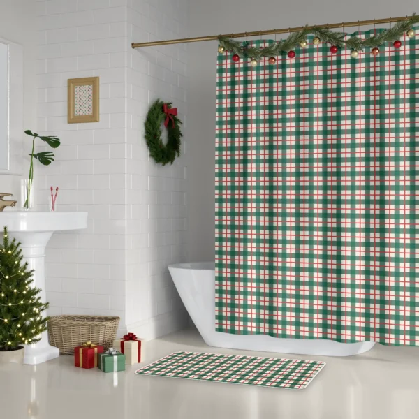 Green check Christmas shower curtain beside a white tub, with a wreath and a small lit tree