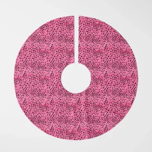 Hot pink spotted tree skirt laid flat, top view on white, black spots swirling over pink