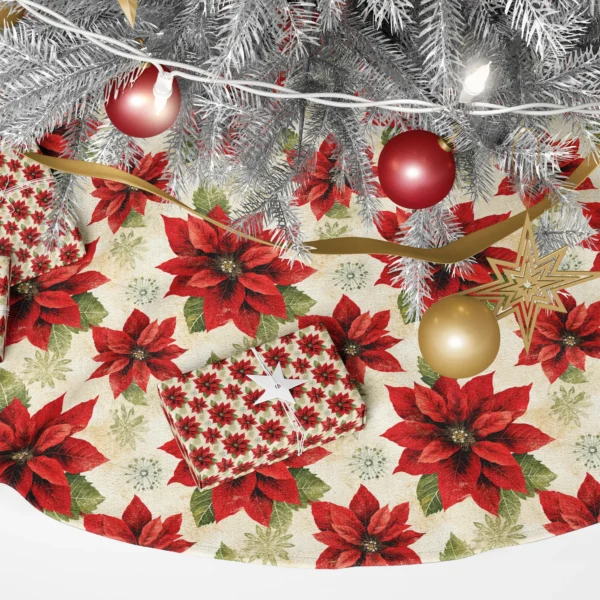 Close view of scarlet poinsettias with golden centers and sage leaves