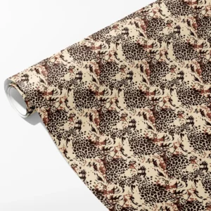 Roll of cream wrapping paper with a brown leopard-style rosette print, partly unrolled on white