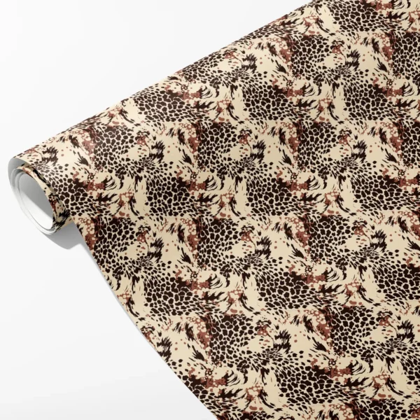 Roll of cream wrapping paper with a brown leopard-style rosette print, partly unrolled on white