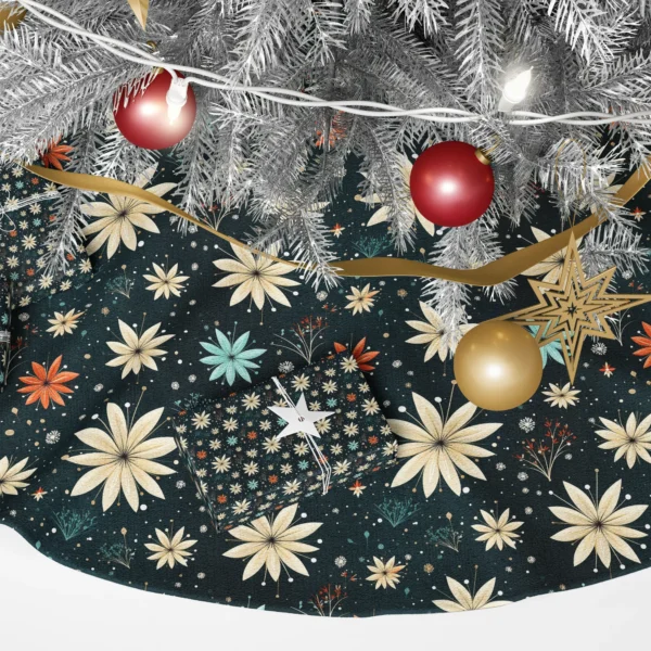 Close-up of the print: cream starflower with a black center beside aqua and orange blooms