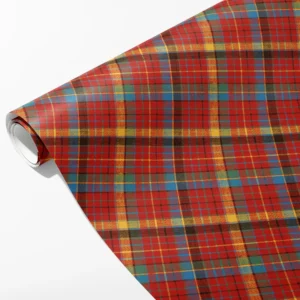 Roll of red flannel-look plaid wrapping paper with gold, blue, green and dark bands, partly unrolled on white