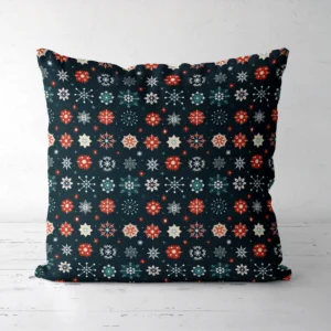 Navy snowflake pillow upright, front showing, white floor beneath