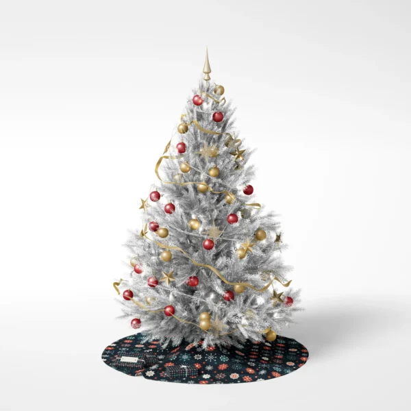 White-backed photo of a decorated tree set on the navy snowflake skirt
