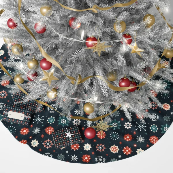 Snowflake tree skirt in navy under twinkling lights and wrapped boxes