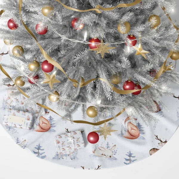 Woodland animal winter tree skirt beneath a glowing tree with gift boxes