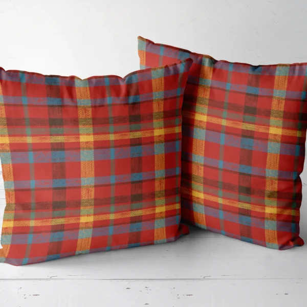 Two patchwork plaid throw pillows side by side