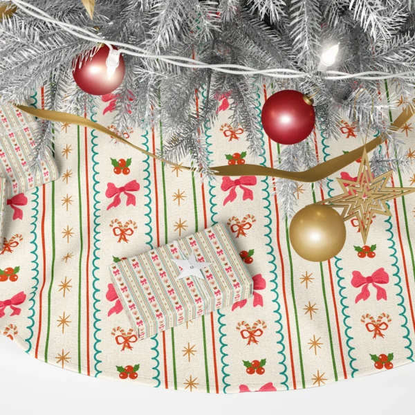Close-up of coral-pink bows, candy cane hearts and holly between teal scallops on cream