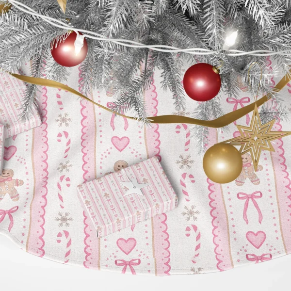 Close-up of gingerbread men with pink bow ties, bows and candy canes between scalloped borders