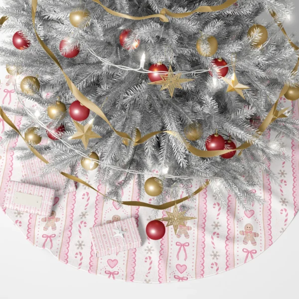Gingerbread tree skirt beneath a lit Christmas tree with gifts