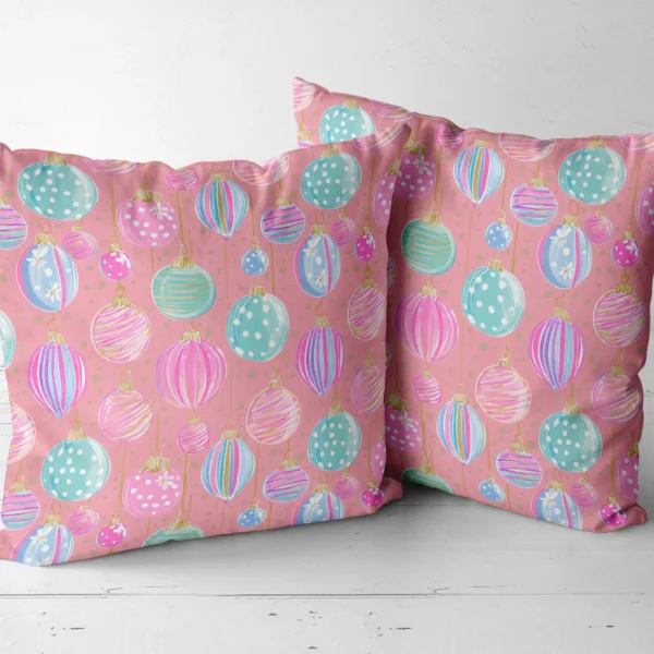 Pair of pink ornament throw pillows next to each other