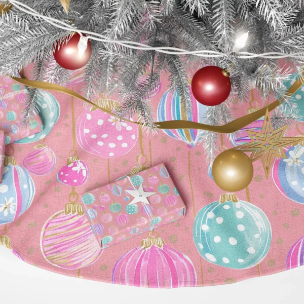 Close-up of striped, dotted and flowered pastel baubles on gold strings over coral pink