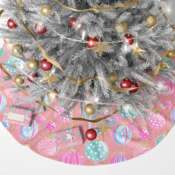 Pink bauble tree skirt beneath a lit Christmas tree with presents