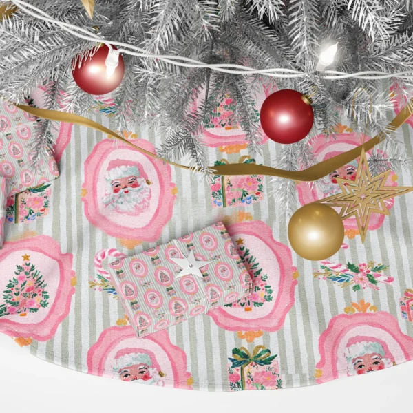 Detail of pink cameo frames with a Santa face and a blossom tree on sage pinstripes