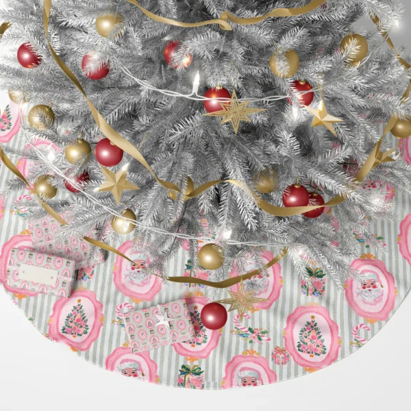 Pink Santa tree skirt beneath a lit Christmas tree with presents