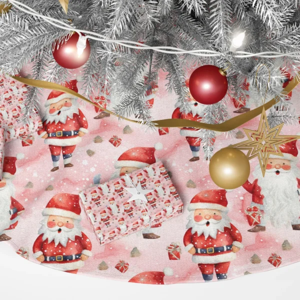 Close view of a round red-coated Santa and a waving tall Santa on blush pink