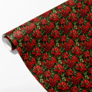 Roll of dark green wrapping paper covered in red poinsettias and leafy foliage, partly unrolled on white